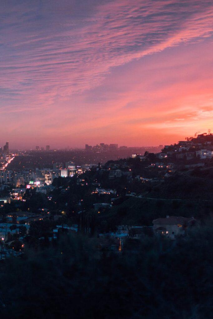 City Near Mountain During Golden Hour